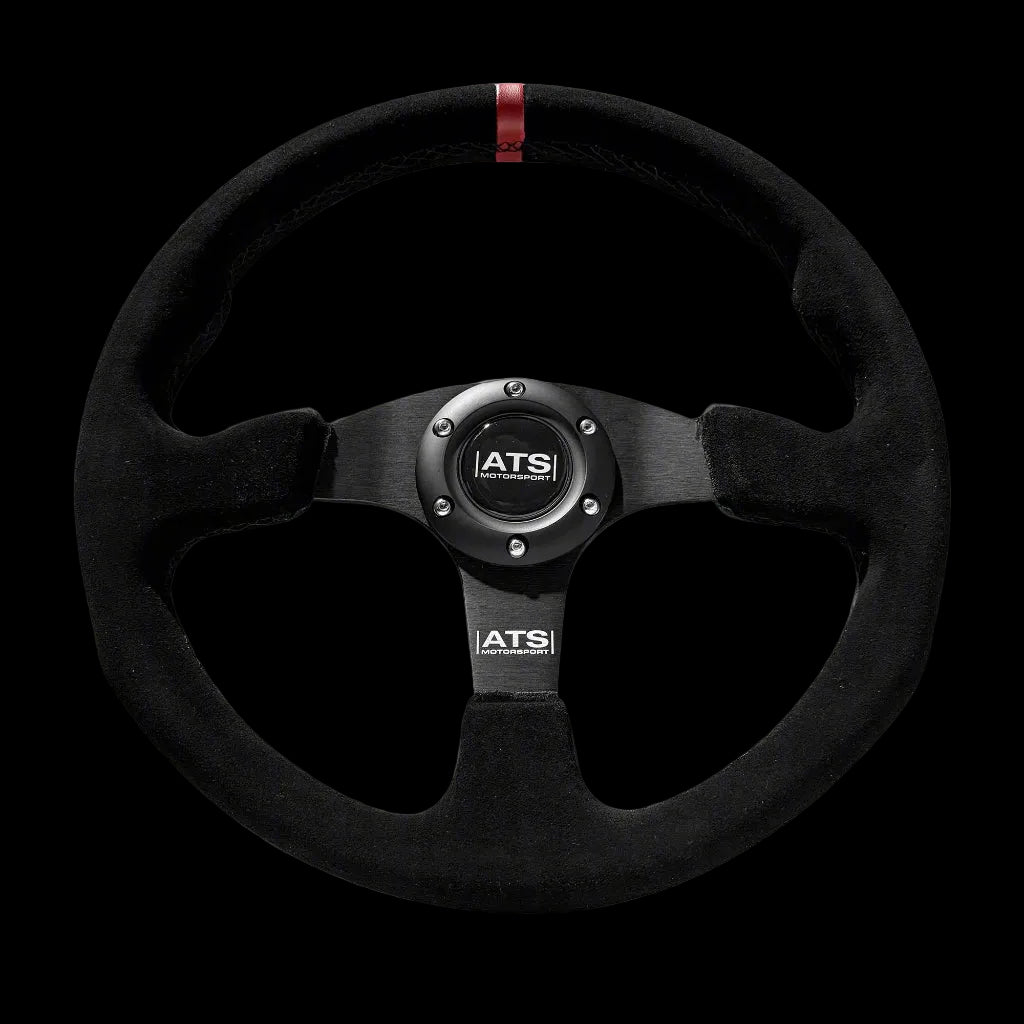 Black steering wheel with ATS logo on a gray background