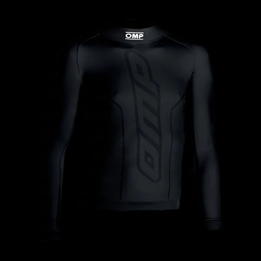 Black long-sleeve compression shirt with OMP logo on a white background