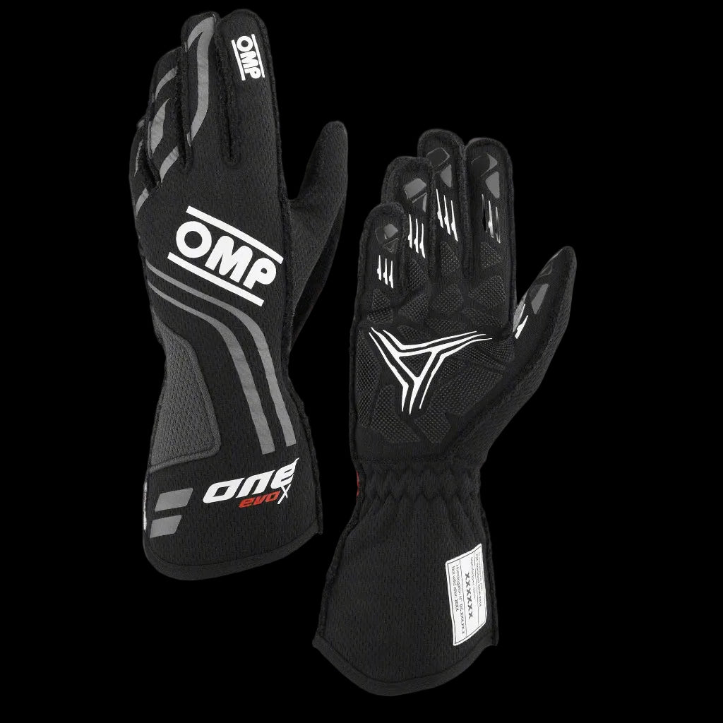 A pair of OMP 'ONE EVO-X' circuit racing gloves in black color, designed for Formula 1 racing with pre-curved fingers and high technology palm in silicon rubber for optimal grip.
