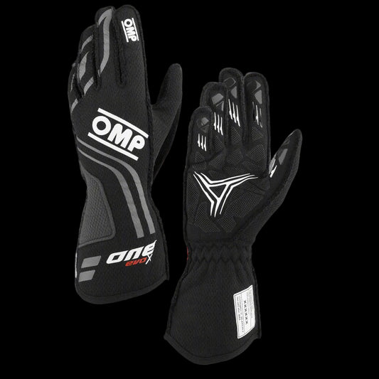 A pair of OMP 'ONE EVO-X' circuit racing gloves in black color, designed for Formula 1 racing with pre-curved fingers and high technology palm in silicon rubber for optimal grip.