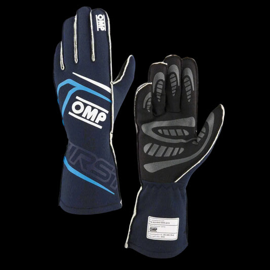 A pair of OMP 'FIRST' Circuit Racing Gloves in navy blue and cyan with silicon palm for grip, elastic band on the wrist, and branding on the cuffs.