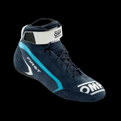 A single circuit racing boot with blue, white, and cyan colors, featuring a lace-up closure and the OMP brand logo.