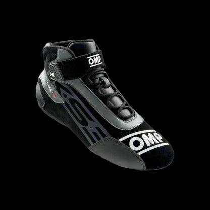 A pair of OMP KS-3 Kart Boots in black and white with visible brand logos, designed for karting with mesh inserts and technical reinforcements.