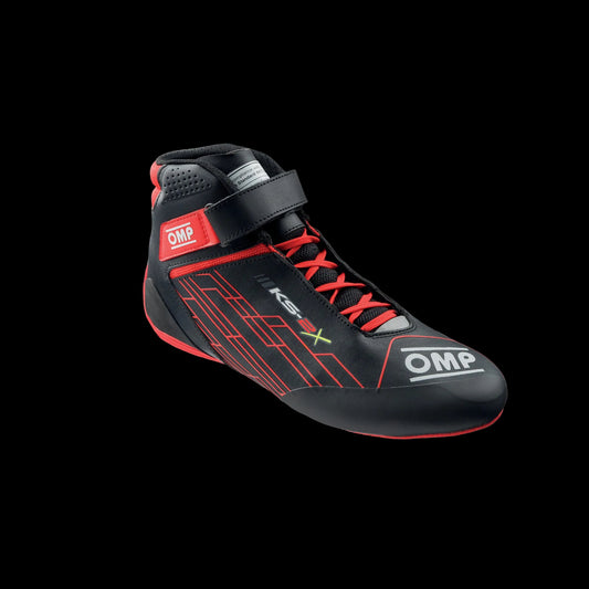 Black and red racing shoe with OMP branding on a white background