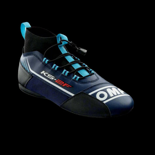 A single OMP KS-2F kart boot in navy blue and cyan with brand logo visible on the side.