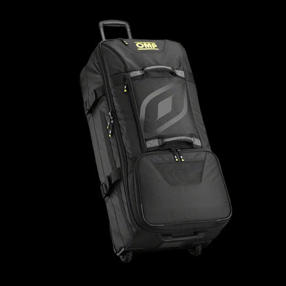 OMP Large Trolley Bag in black color with logos, featuring a double handle, resistant cargo wheels, and a rigid bottom.