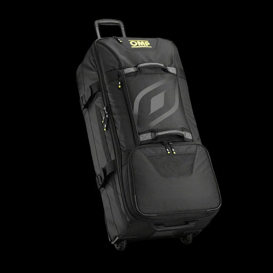 OMP Large Trolley Bag in black color with logos, featuring a double handle, resistant cargo wheels, and a rigid bottom.