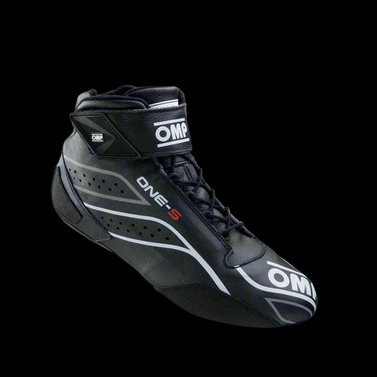 A single black OMP 'ONE-S' circuit racing boot with red accents, featuring a Velcro strap and brand logos on the side.